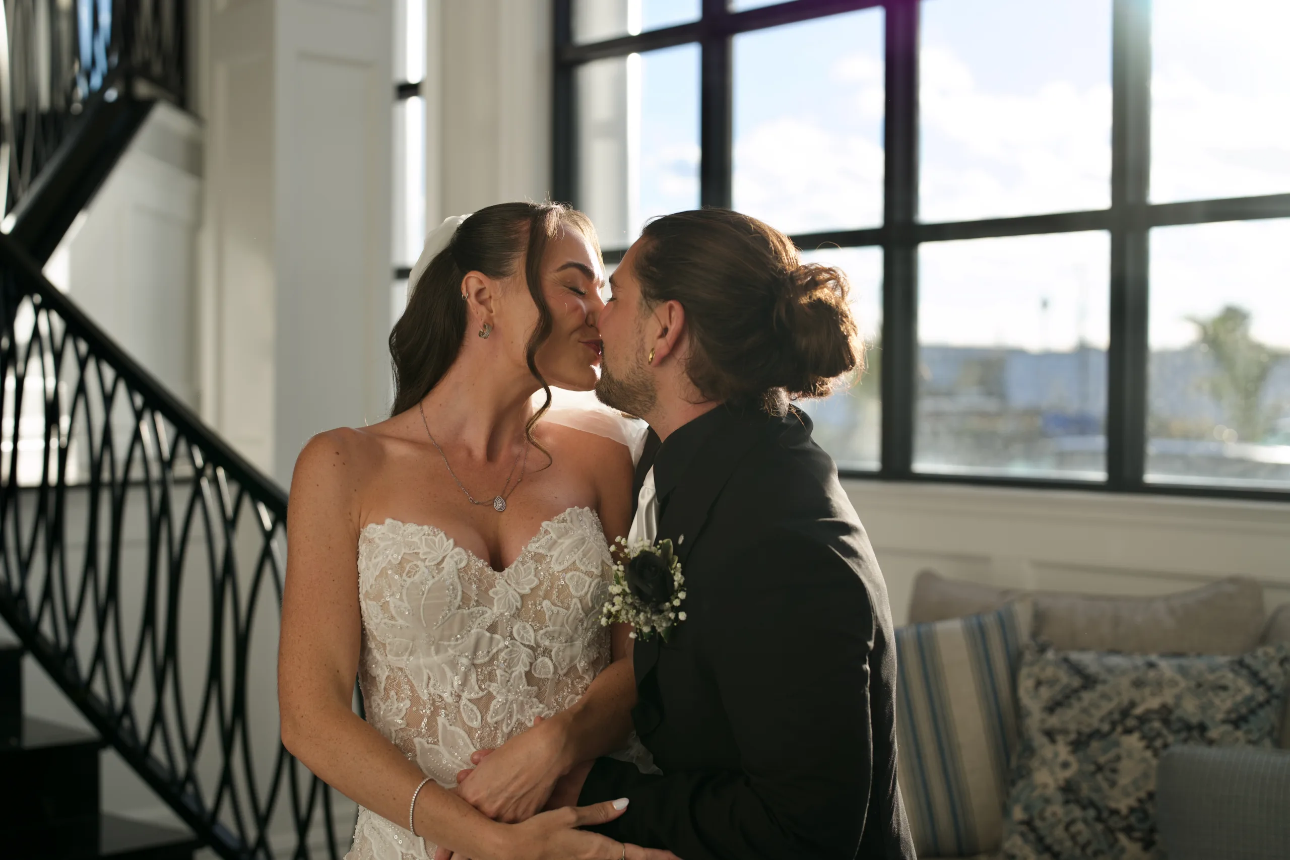 Couple by a window
