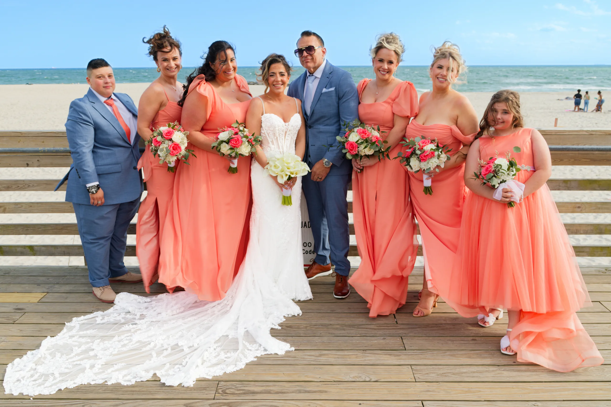 Wedding party together outdoors