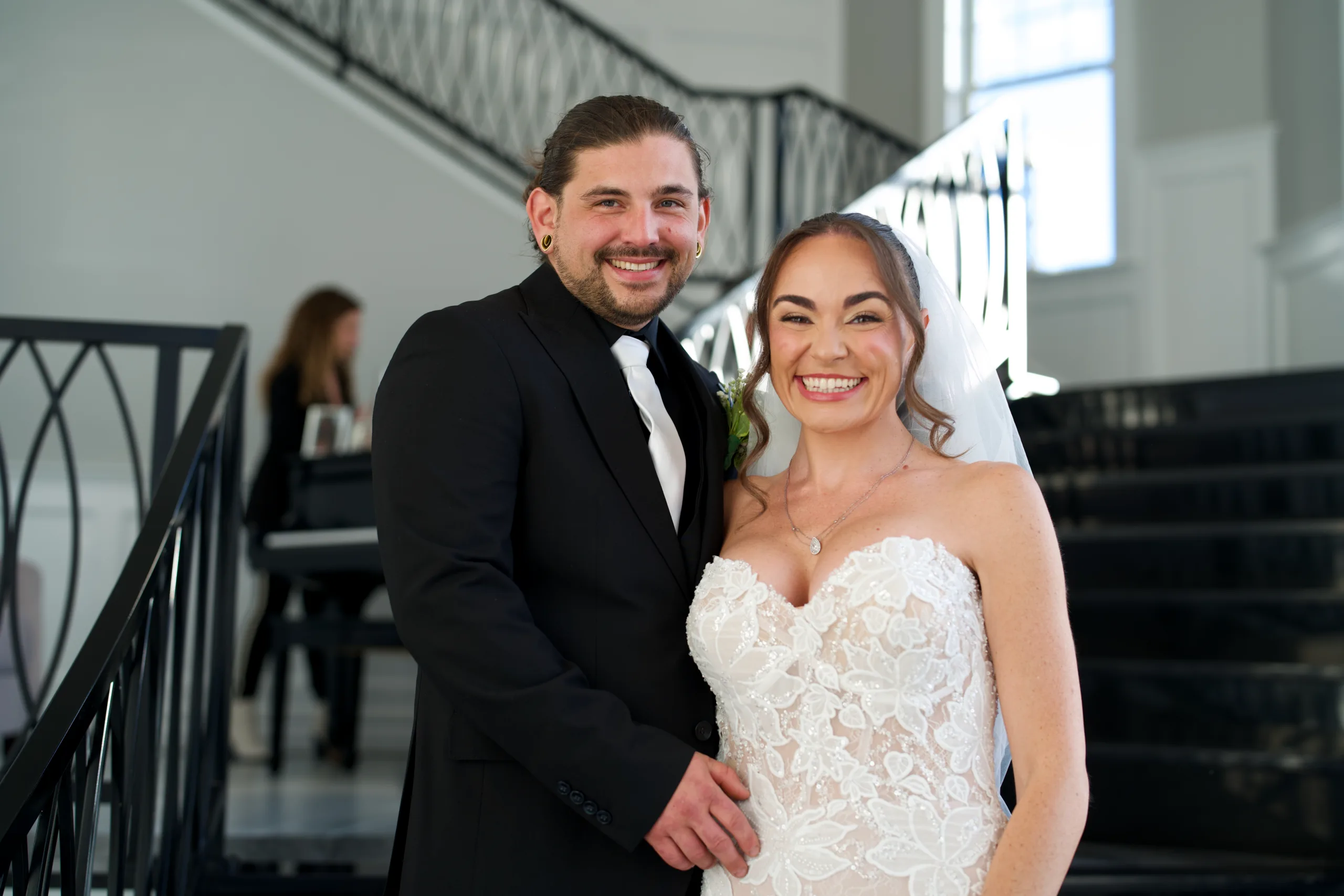 Bride and groom smiling together