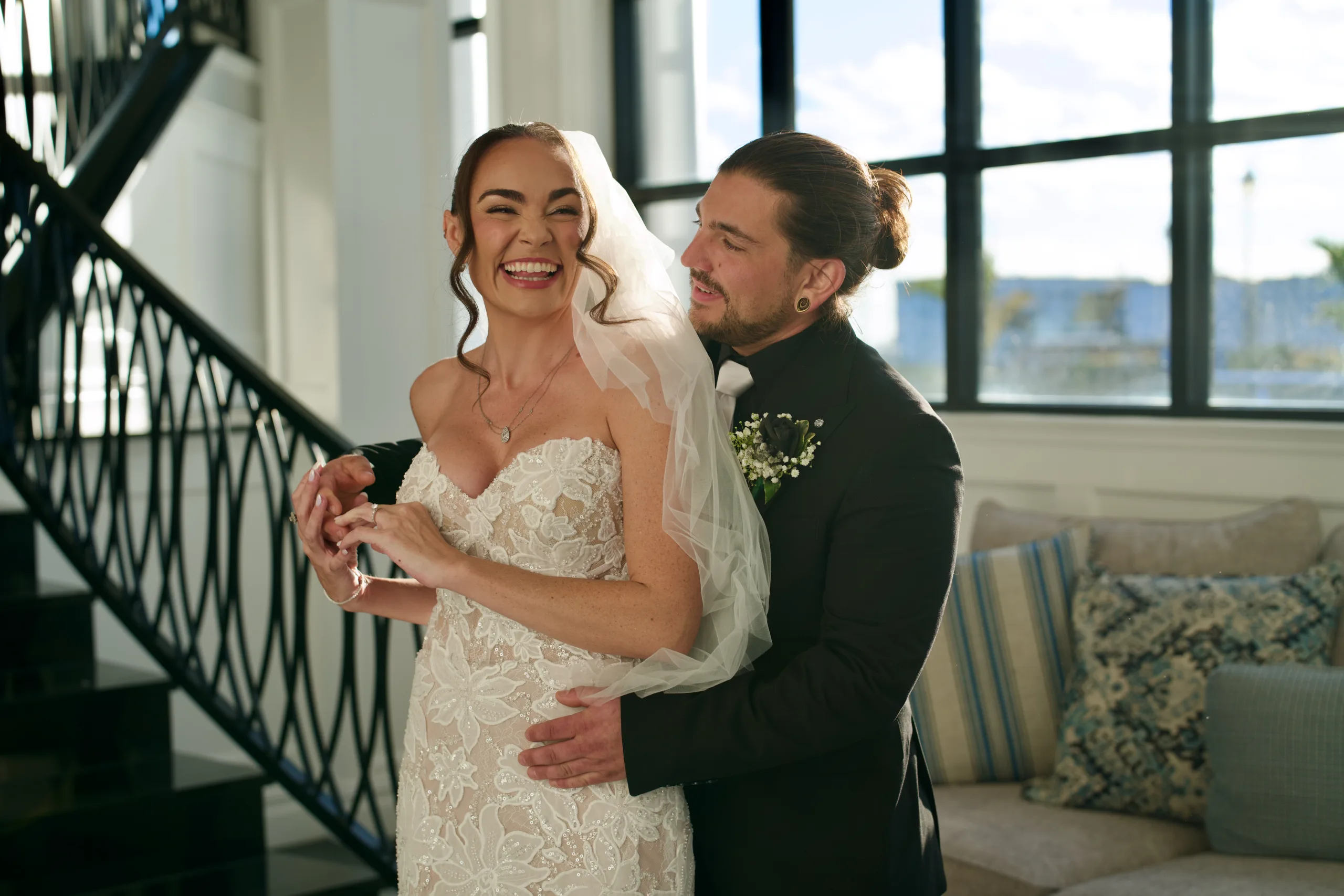 Couple near a sunlit window